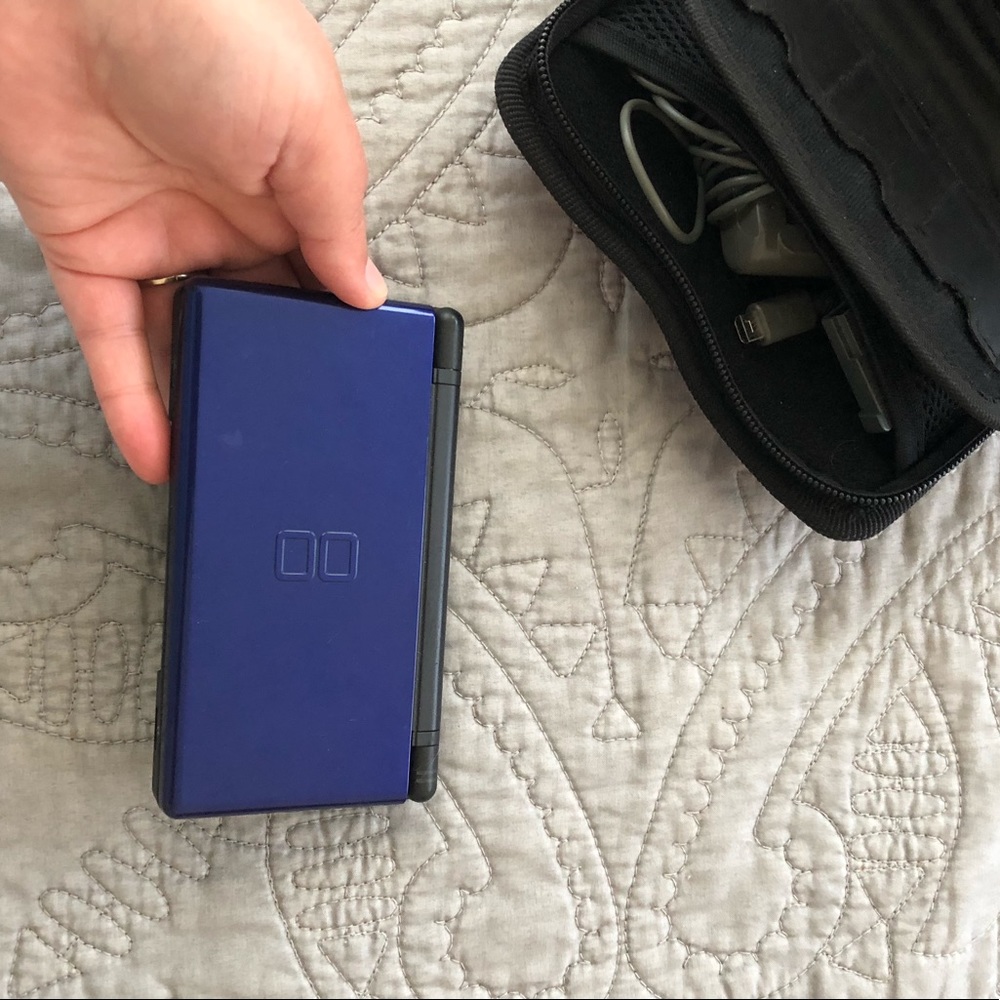 Nintendo DS with case, charger, and 1 game